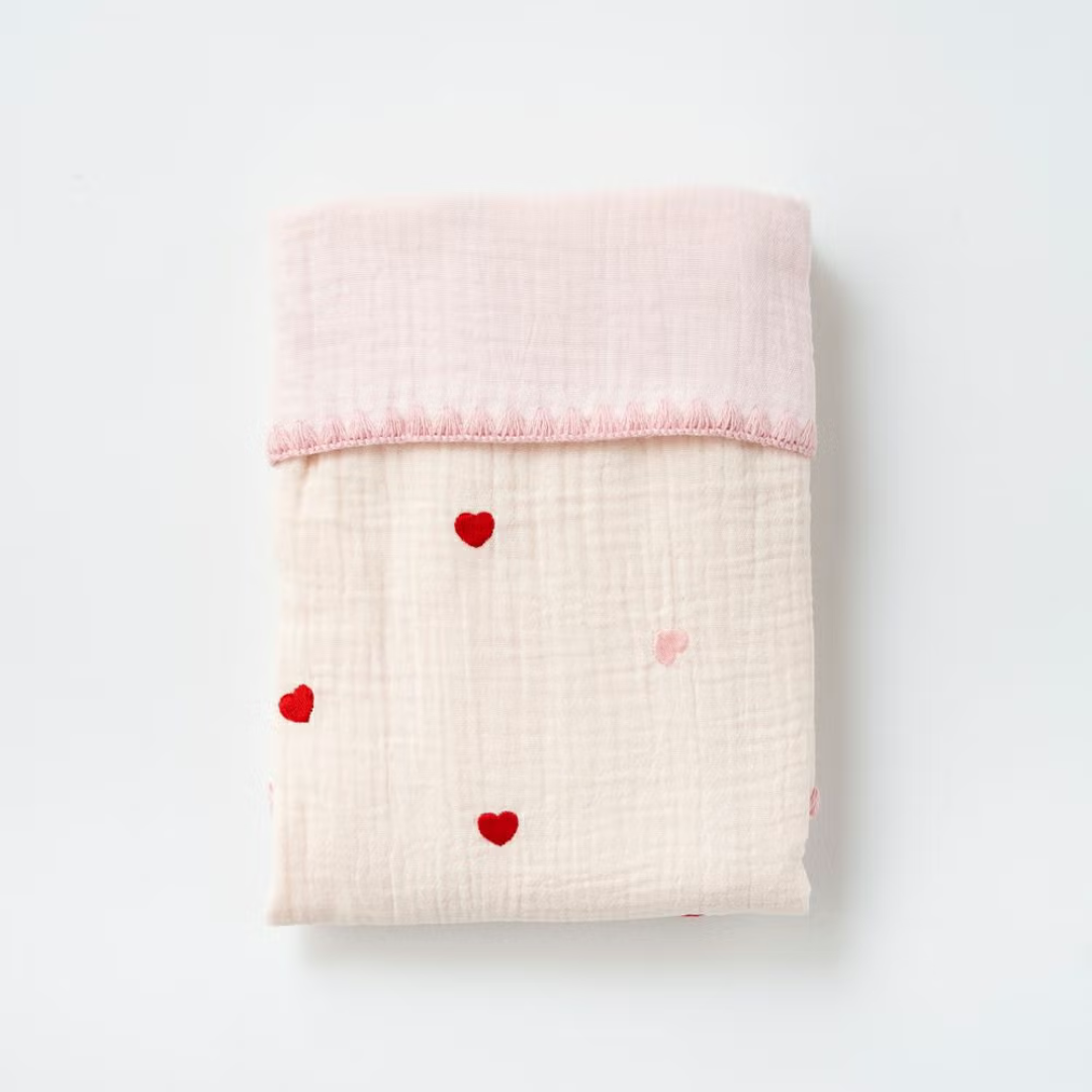 株式会社アミングが販売する4重ガーゼおくるみ刺繍 全3種